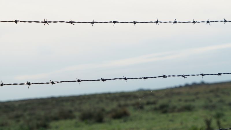 Barbed Wire Fence Installation